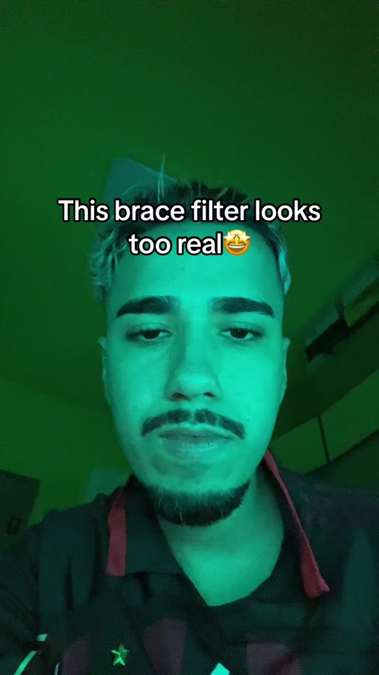 Braces Filter: a frame of a post of the trend by @davidmaluco_ on TikTok