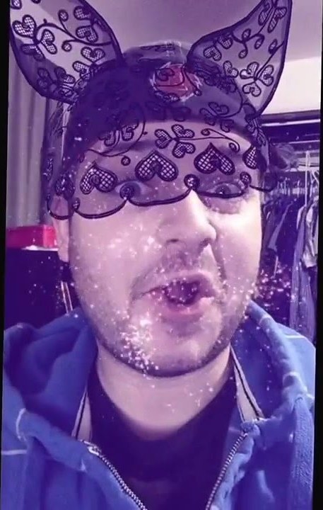 Cat Ears Filter: a frame of a 2016 post of the Snapchat cat ear lace lens by Justin Castleman on YouTube